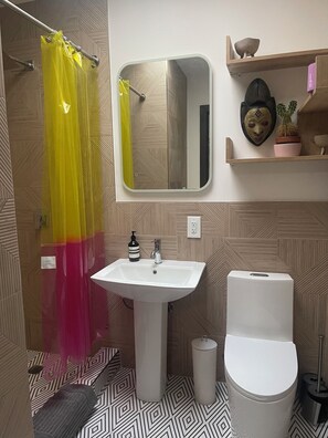 Shower, hair dryer, towels, soap