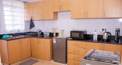 Stylish Modern Suite- Netflix +Balcony: The Monarch