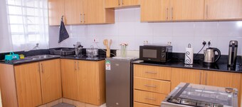 Stylish Modern Suite- Netflix +Balcony: The Monarch
