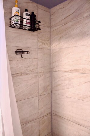 Shower, hair dryer, towels, soap