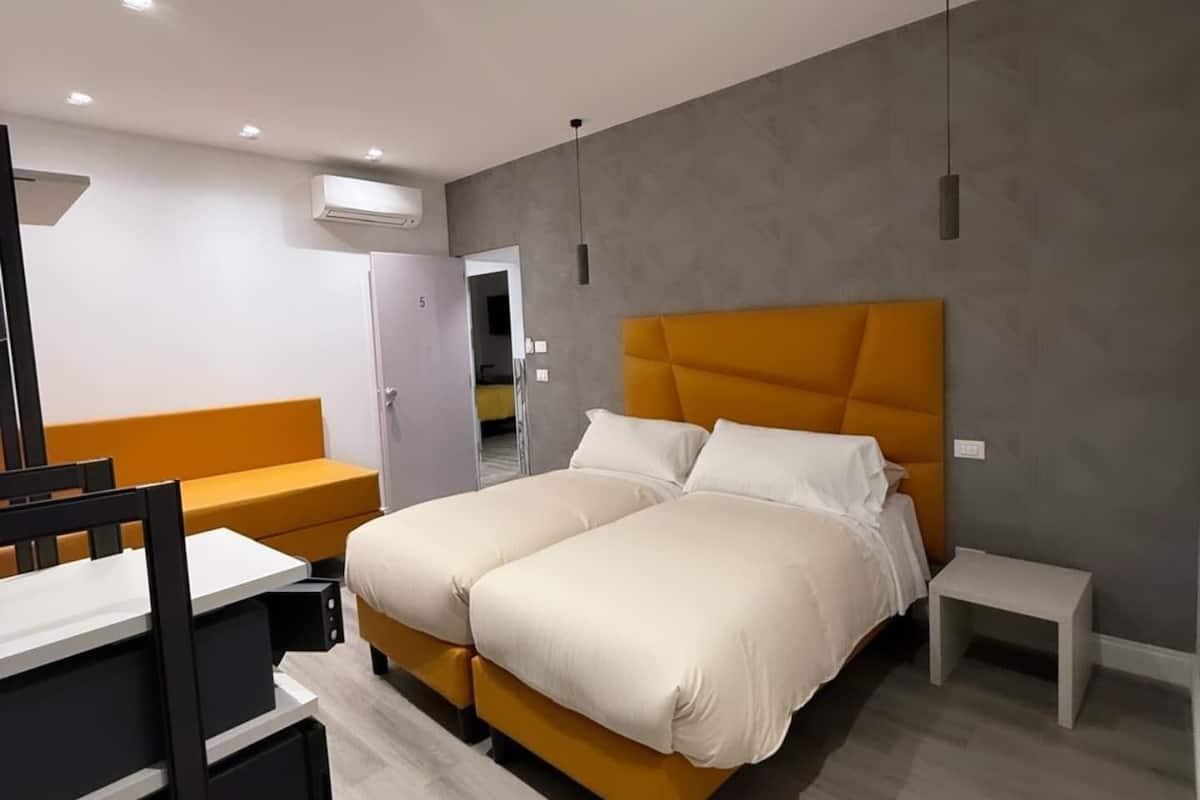 Triple Room | In-room safe, desk, laptop workspace, blackout curtains