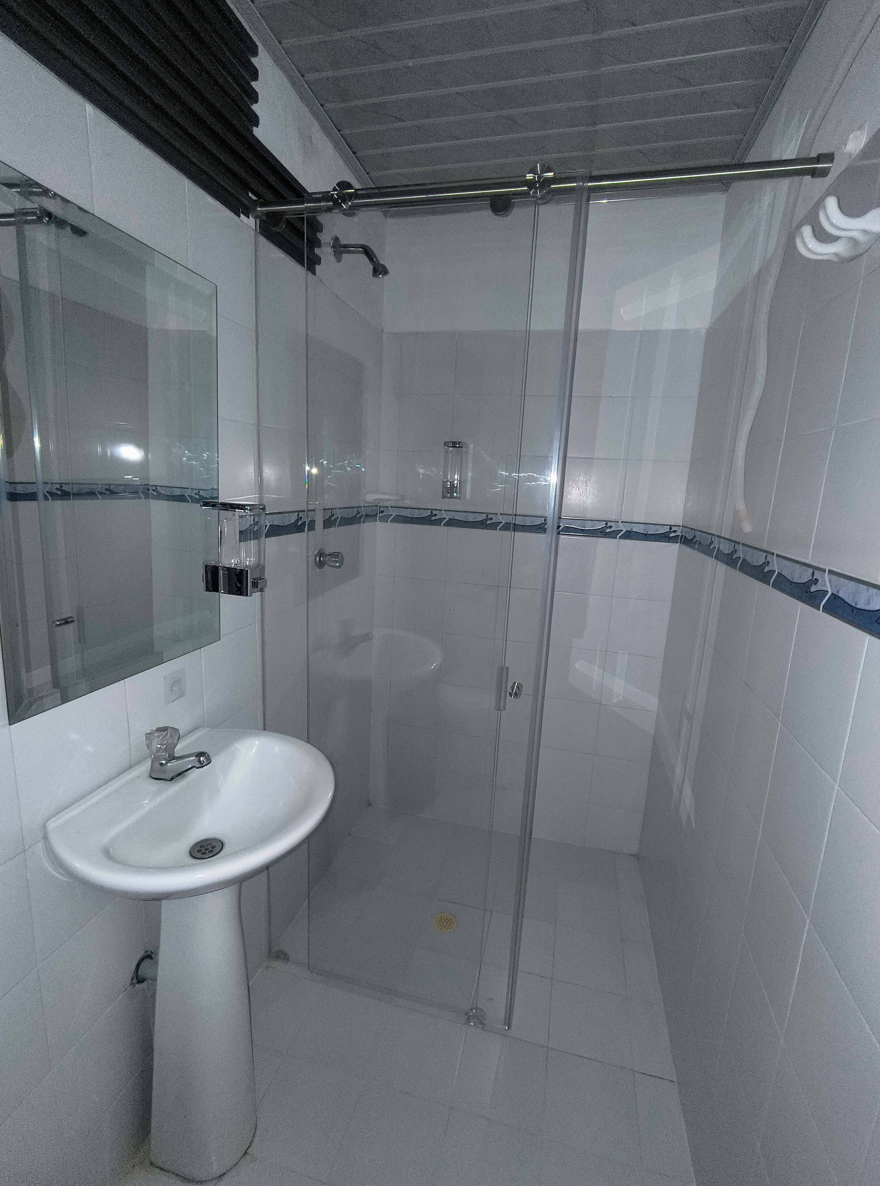 Shower, towels, soap, toilet paper