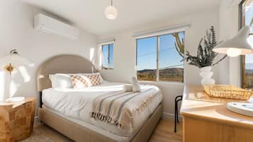 2 bedrooms, desk, iron/ironing board, travel crib