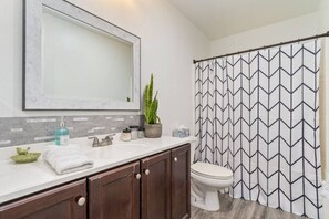 Hair dryer, towels, soap, shampoo