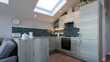 Réfrigérateur, micro-ondes, lave-vaisselle, cafetiÚre/bouilloire