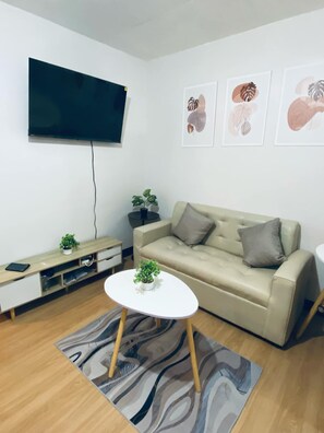 Living area - Minimalist Aesthetic Family-sized condo (Marilao)