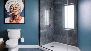 Shower, hair dryer, towels, soap
