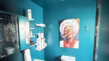 Shower, hair dryer, towels, soap