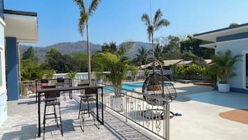 Family Room, Pool View | Terrace/patio