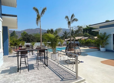 Family Room, Pool View | Terrace/patio