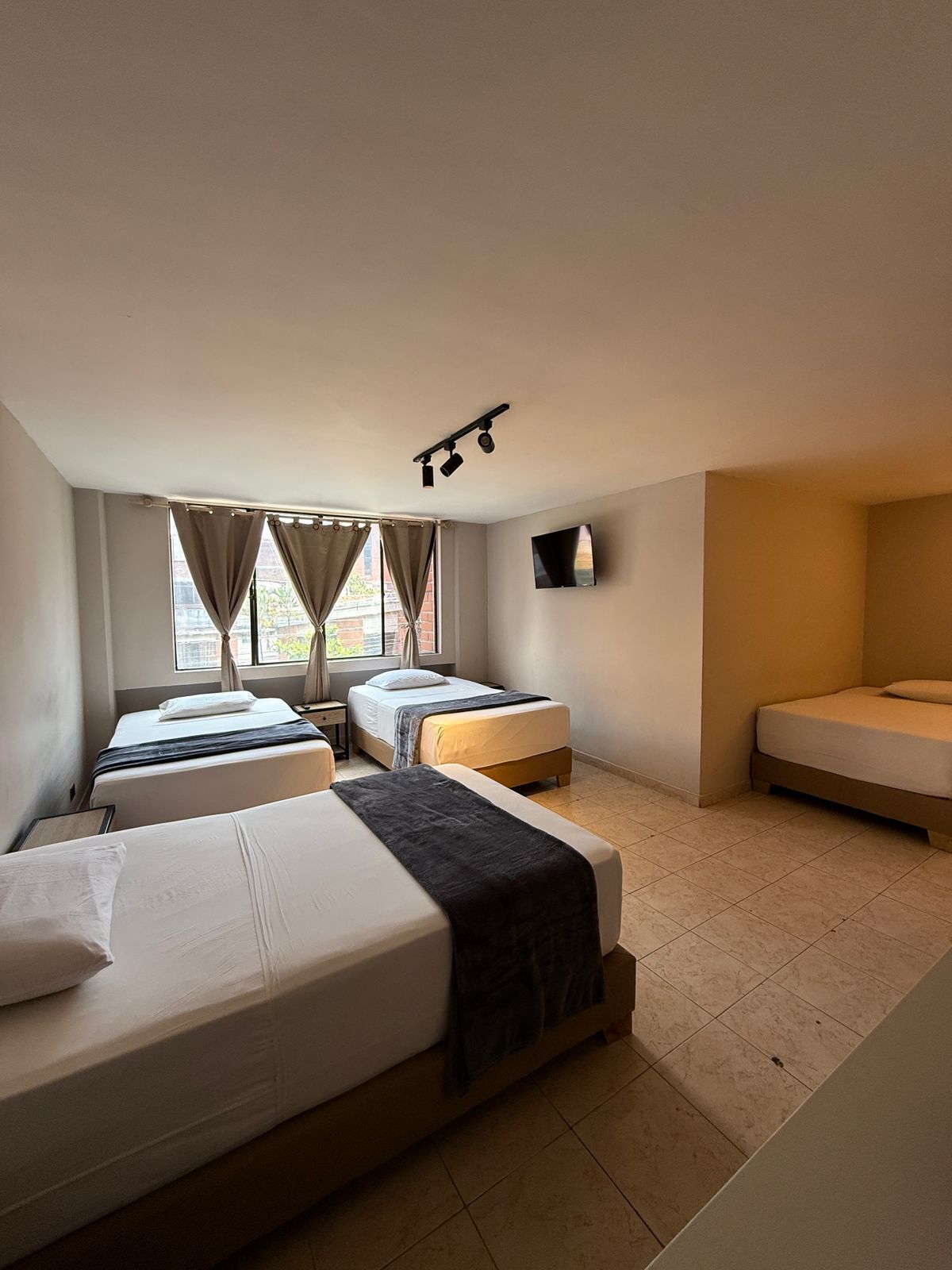 Comfort Quadruple Room, City View | 1 bedroom, free WiFi, bed sheets