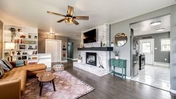 Smart TV, fireplace, books, music library