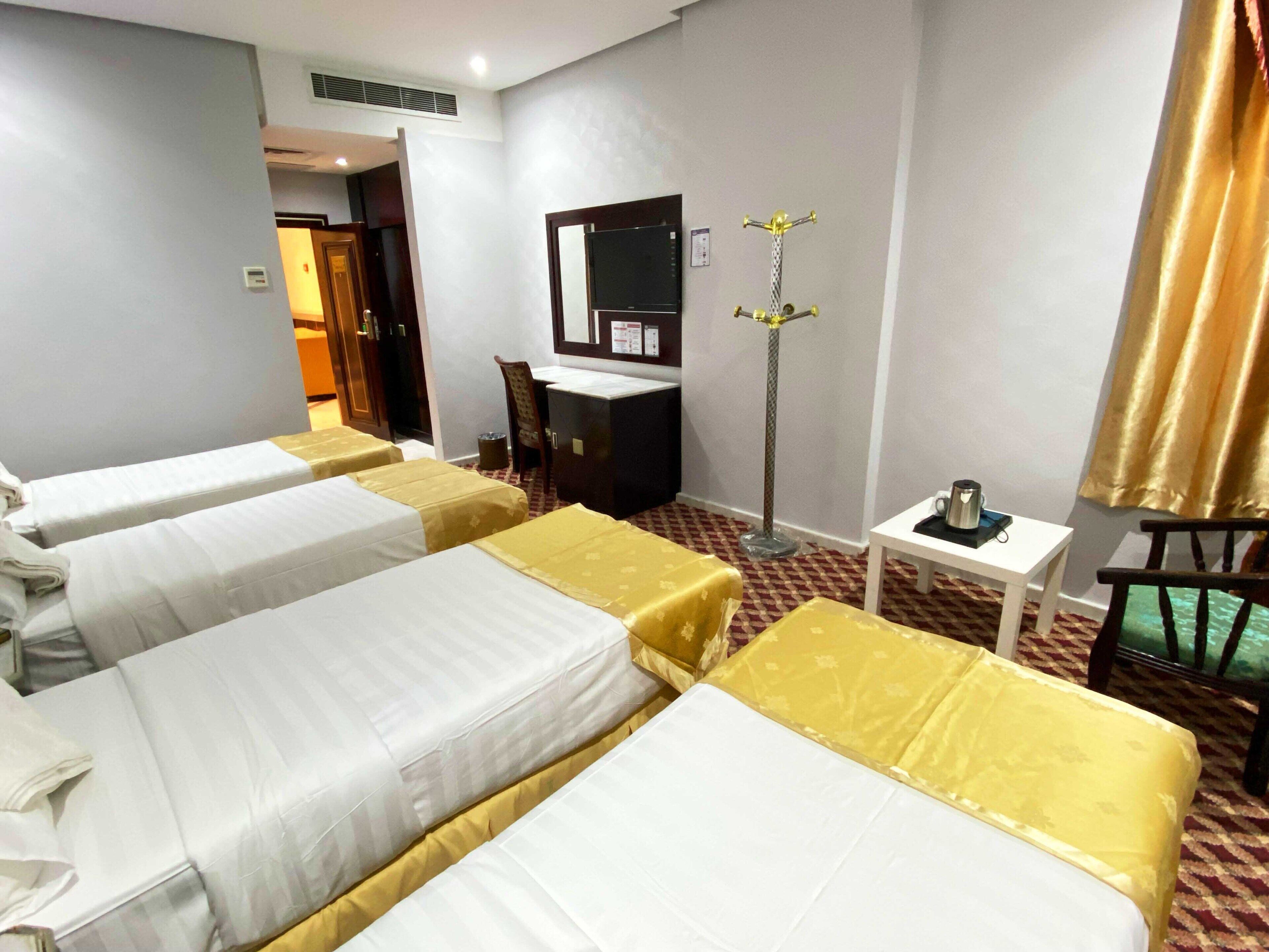 Quadruple Room, Air conditioning | In-room safe, laptop workspace, soundproofing, iron/ironing board