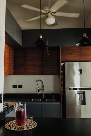 Oven, stovetop, coffee/tea maker, cookware/dishes/utensils