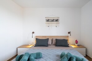 2 dormitorios, tabla de planchar con plancha, wifi gratis y ropa de cama