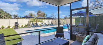 Serenity Oasis - Villa 1 - Professionally Designed Duplex Home with Luxurious Heated Pool and Spa!