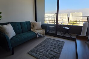 Apartamento | Área de estar | TV de tela plana