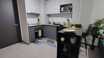Apartamento | Cocina privada | Mesa de comedor
