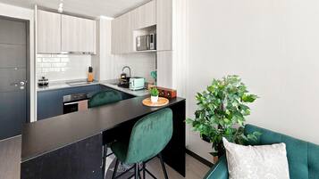 Apartment | Private kitchen | Dining table