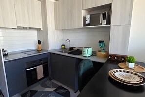 Departamento | Cocina privada | Comedor 
