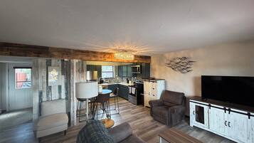 Smart TV, fireplace, table tennis, books