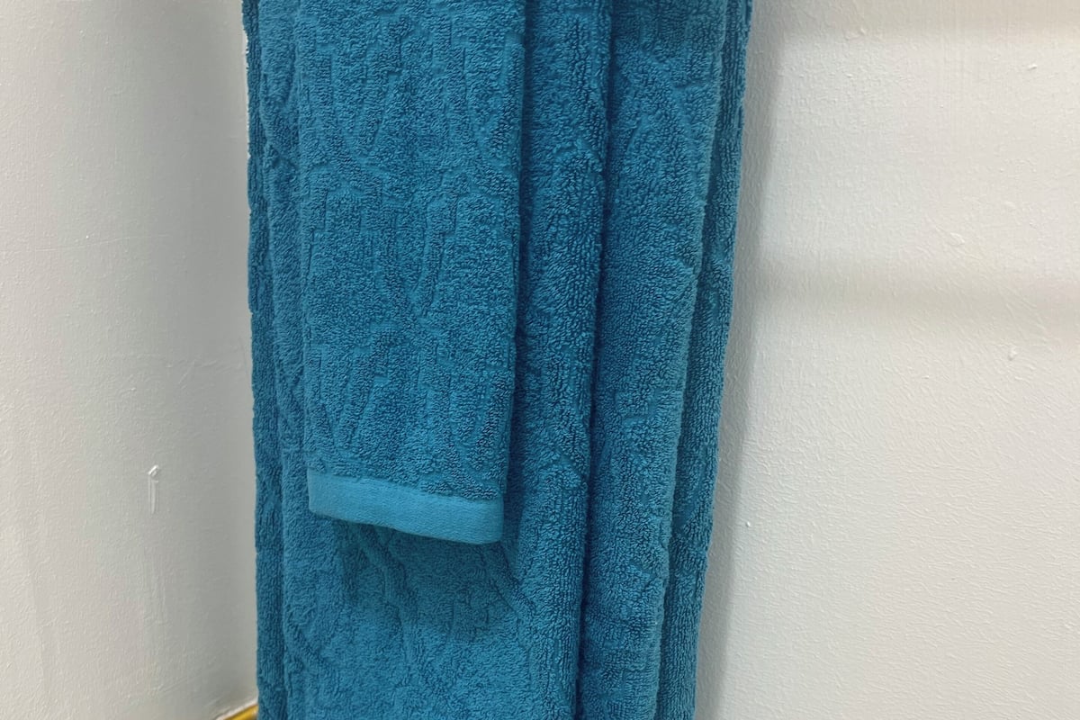 Shower, towels, soap, shampoo