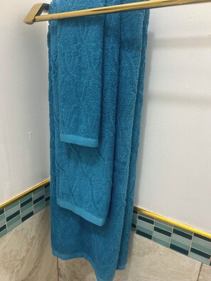 Shower, towels, soap, shampoo