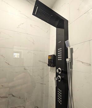 Shower, hair dryer, towels, soap - Modern Townhome with Midtown Skyline views (Atlanta)