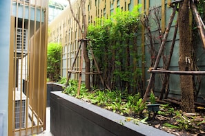 Vertical garden adds a touch of nature to the building's exterior.