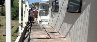 3-bedroom house overlooking Baylys Beach with WiFi and large garden and deck