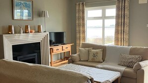 TV, fireplace - Cozy Waterside Retreat Ballyvaughan 3 (Ballyvaughan)