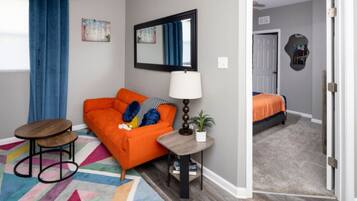 1 bedroom, desk, iron/ironing board, travel crib