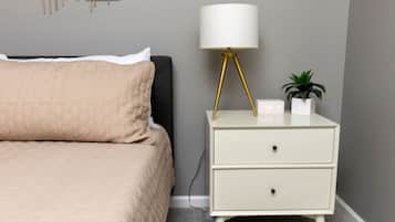 1 bedroom, desk, iron/ironing board, travel crib