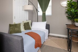 1 bedroom, desk, iron/ironing board, travel cot