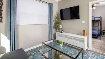 1 bedroom, desk, iron/ironing board, travel crib