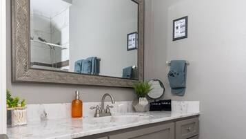 Hair dryer, towels, soap, shampoo