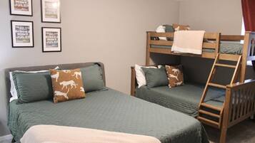 1 bedroom, desk, iron/ironing board, travel crib