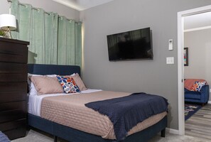 1 bedroom, desk, iron/ironing board, travel cot