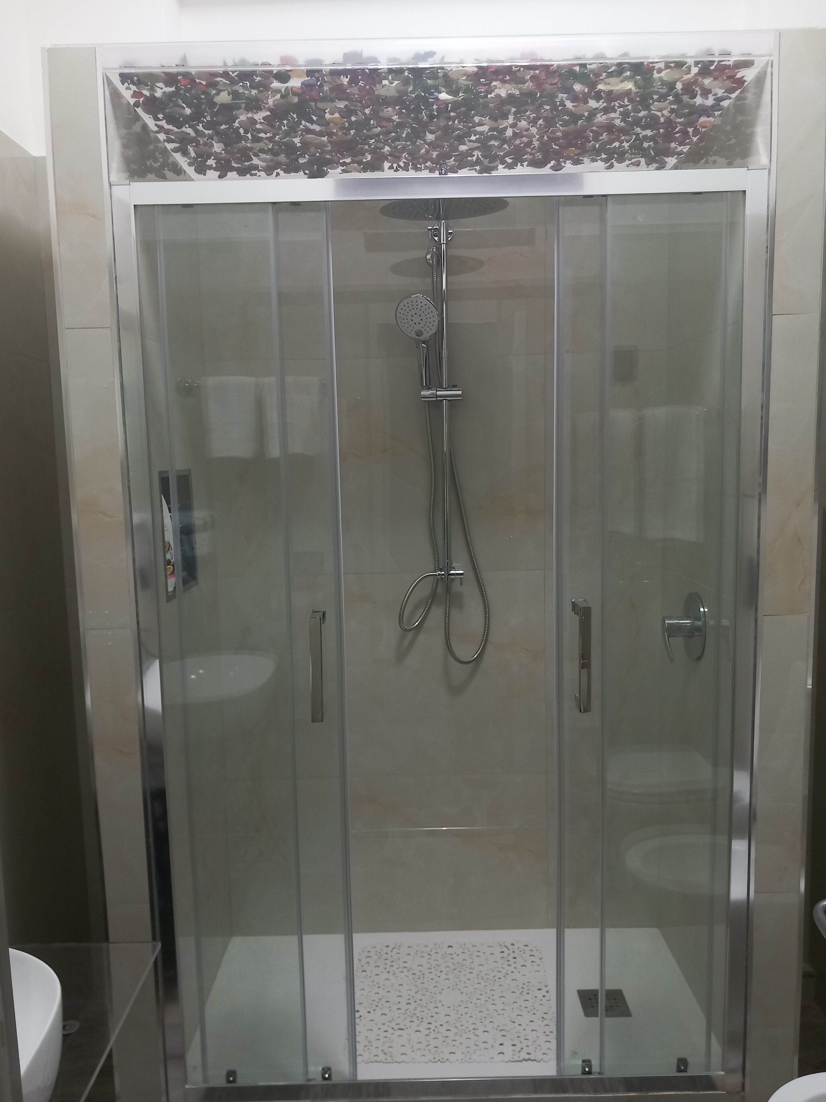 Shower, eco-friendly toiletries, hair dryer, bidet