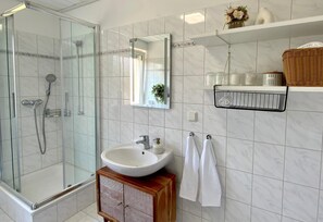 Hair dryer, towels, soap, toilet paper
