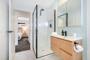 Shower, hair dryer, towels