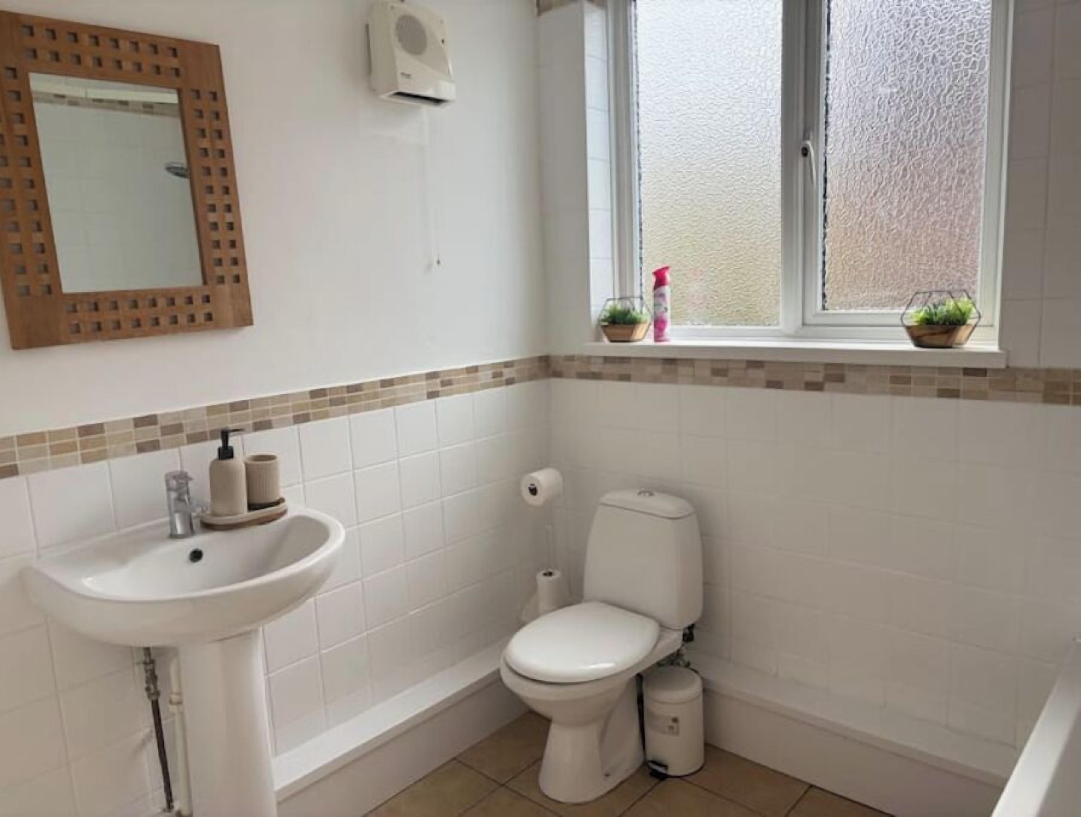 Shower, towels, soap, toilet paper