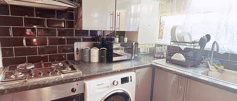 Apartment | Private kitchen | Fridge, microwave, oven, stovetop