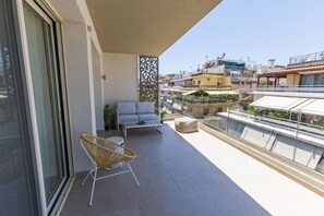 Deluxe appartement, balkon, uitzicht op de stad | Terras