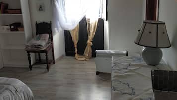 1 habitación, acceso a internet y ropa de cama