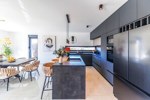 Deluxe Villa, Garden View | Private kitchen | Full-size fridge, microwave, oven, stovetop - Luxury Villa Podversie with pool (Debeljak)