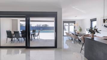 Deluxe Villa, Garden View | Living area | Table tennis, toys