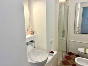 Shower, eco-friendly toiletries, hair dryer, bidet