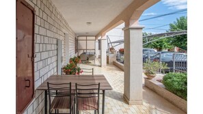 Appartamento, 1 camera da letto, patio | Sala da pranzo