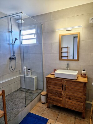 Shower, hair dryer, towels, soap